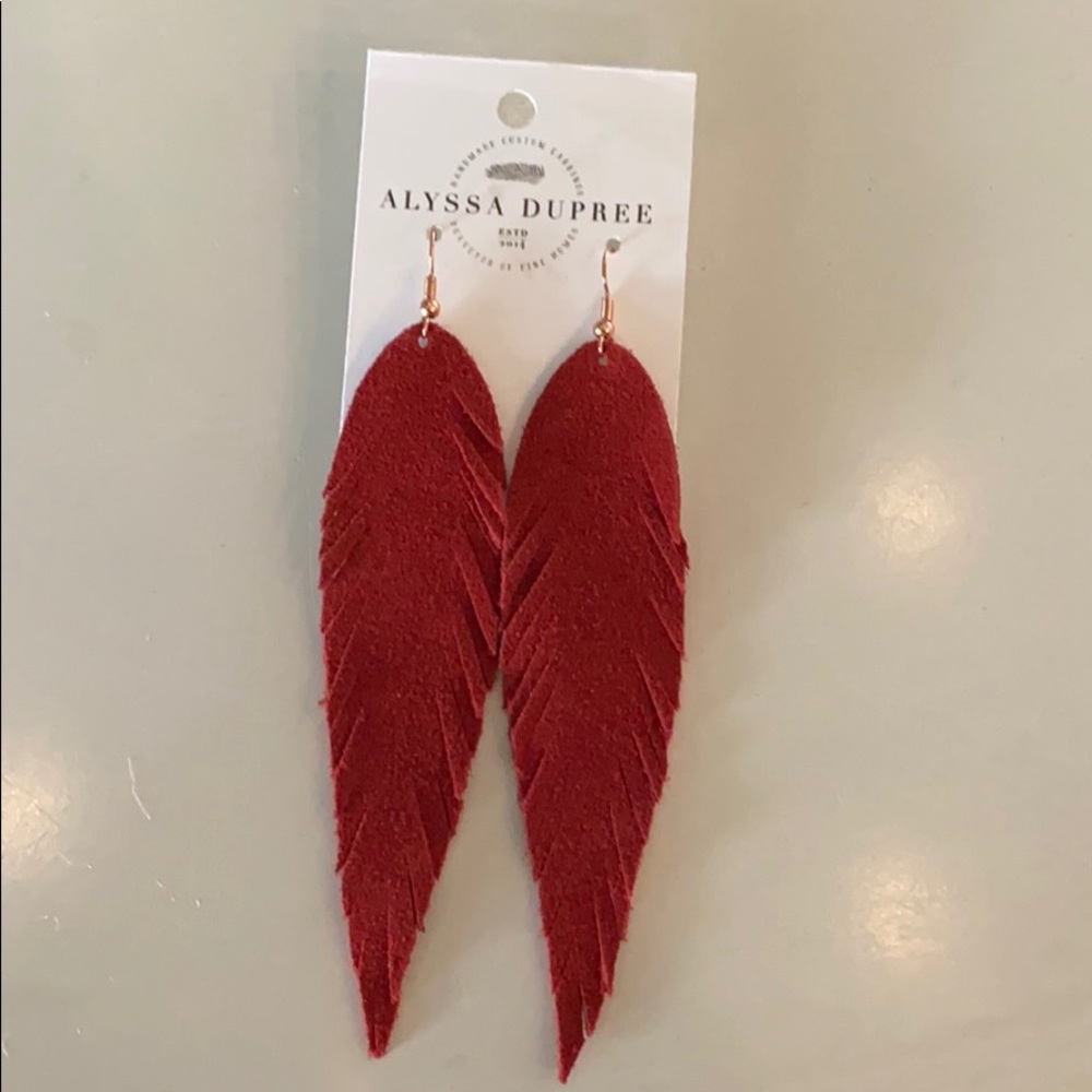 Red leather “feather” earrings